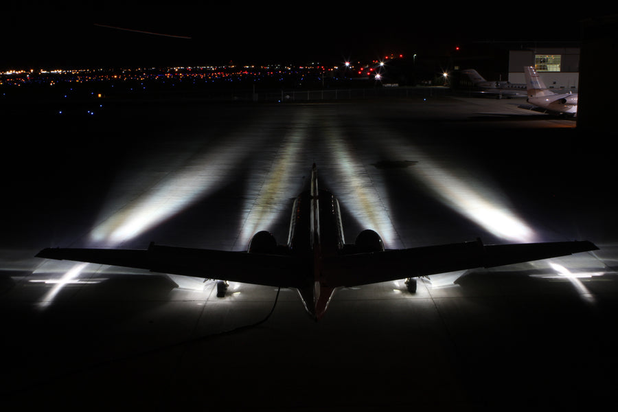 Landing Lights for Citation At Night on Runway