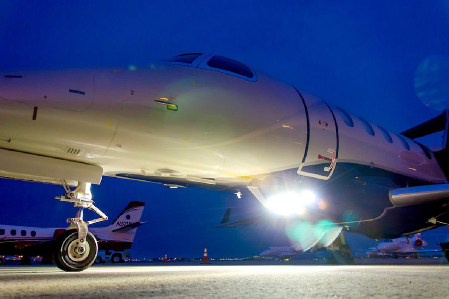 BoomBeam HID landing and taxi lighting system for the Phenom 300 Installed at Night